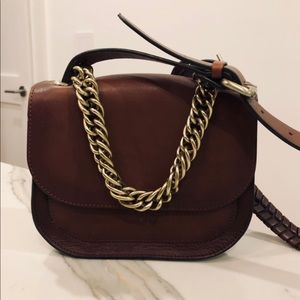 Leather cross body bag with chain